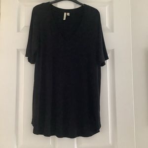 Woman’s “shannonpassero” brand black t shit.